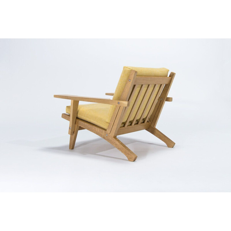 Fauteuil vintage GE375 en bois de chêne et laine par Hans Wegner pour Getema, 1960