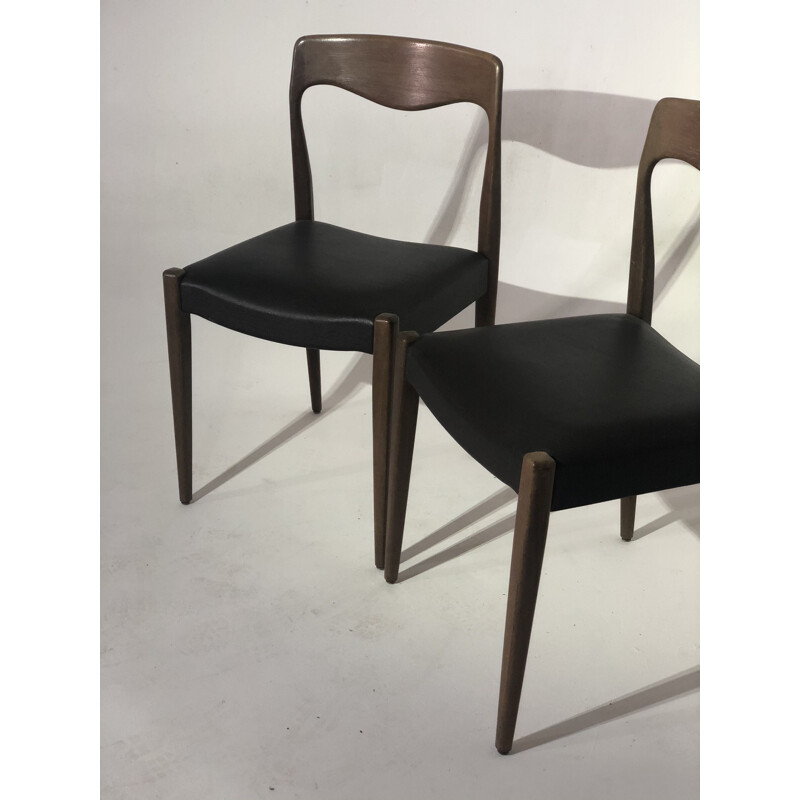 Pair of vintage chairs in skai and teak by Niels Otto Moller