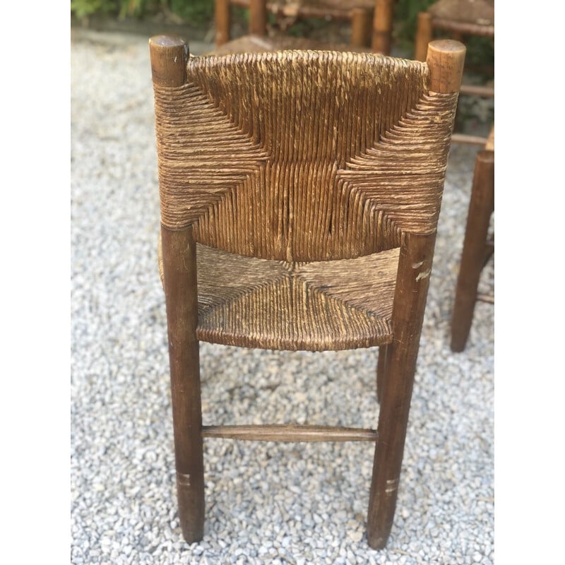 Set of 6 vintage stained wood and straw chairs by Charlotte Perriand for Blanchon, 1950