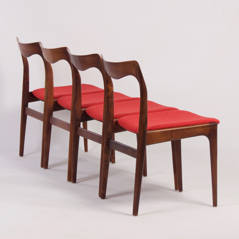 Suite di quattro sedie in palissandro con seduta rossa - 1960