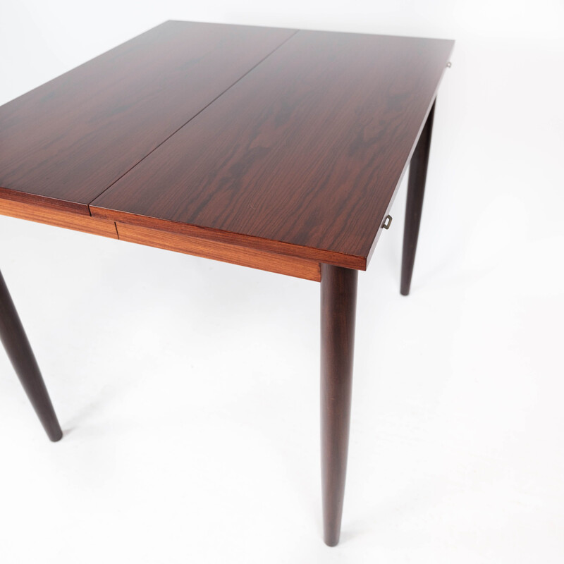 Vintage dining table in rosewood with extension plates by Arne Vodder, 1960s