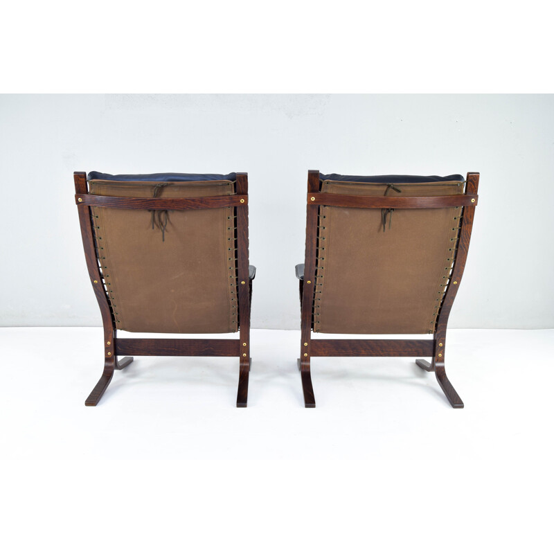Pair of vintage Siesta leather armchairs and one ottoman by Ingmar Relling for Westnofa, Norway 1970s