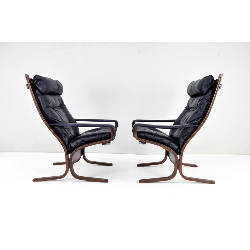 Pair of vintage Siesta leather armchairs and one ottoman by Ingmar Relling for Westnofa, Norway 1970s