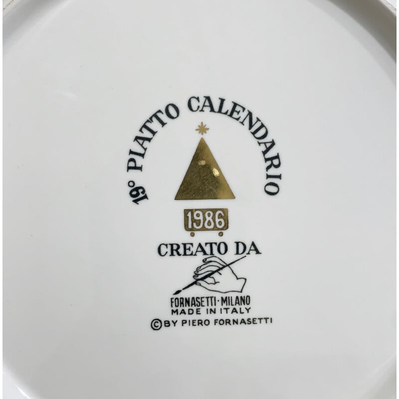 Piatto calendario in porcellana d'epoca di Piero Fornasetti, 1986