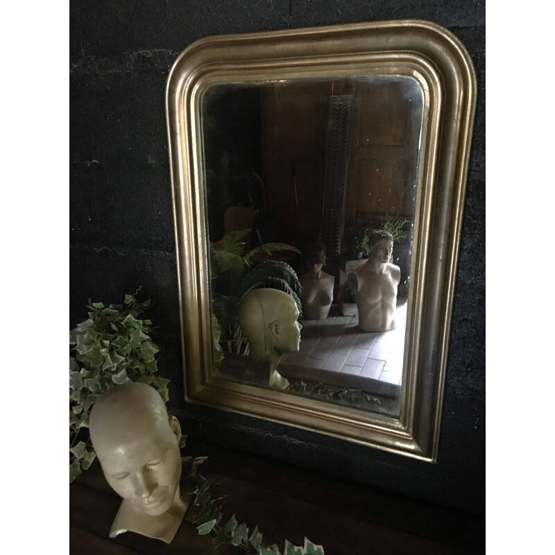 Vintage wood and gilded stucco mirror