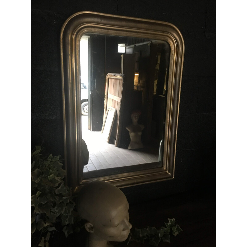 Vintage wood and gilded stucco mirror