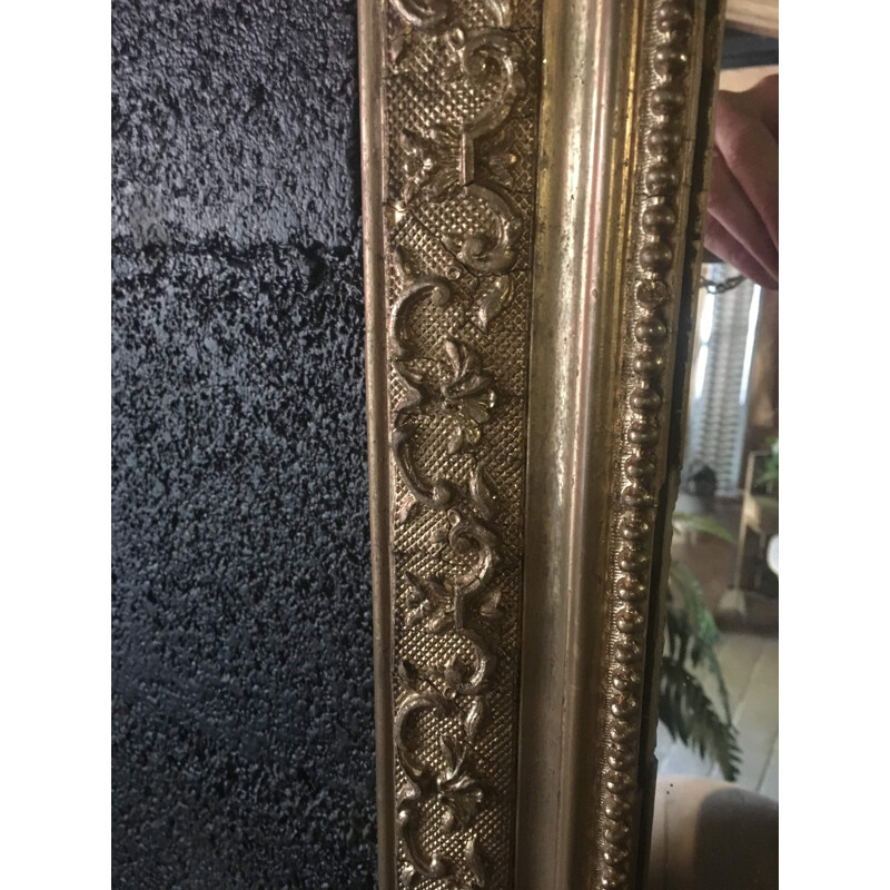 Vintage wood and gilded stucco mirror