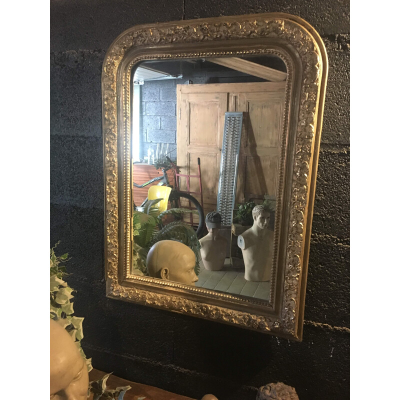 Vintage wood and gilded stucco mirror