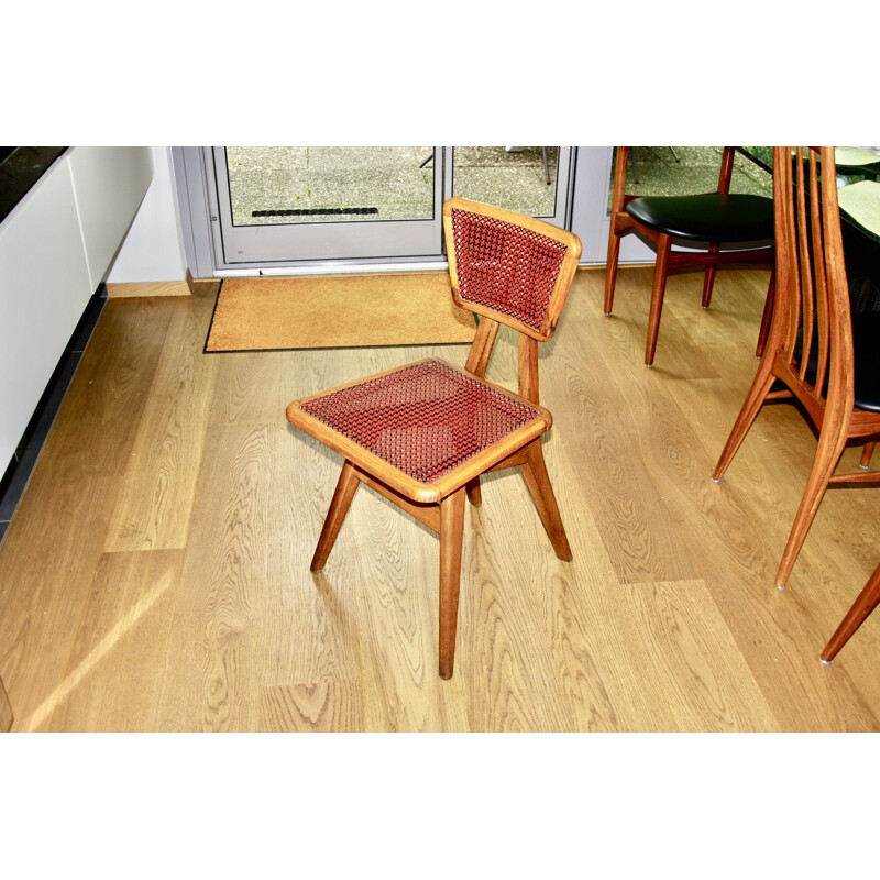 Vintage chair in beech and red and black cane by Pierre Cruège for Roset, 1950