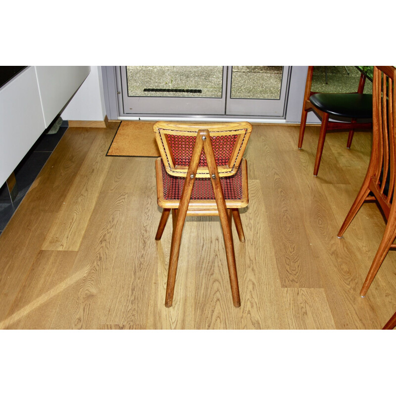 Vintage chair in beech and red and black cane by Pierre Cruège for Roset, 1950