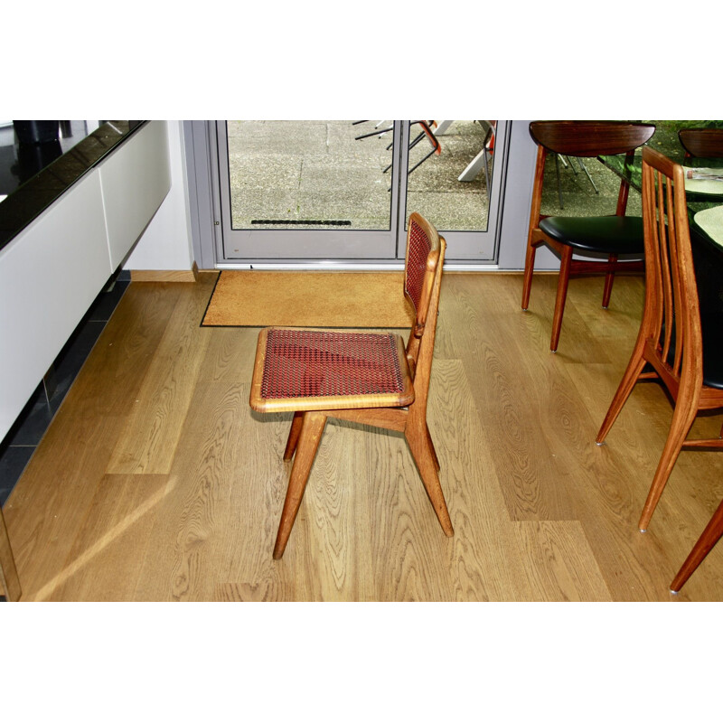 Vintage chair in beech and red and black cane by Pierre Cruège for Roset, 1950