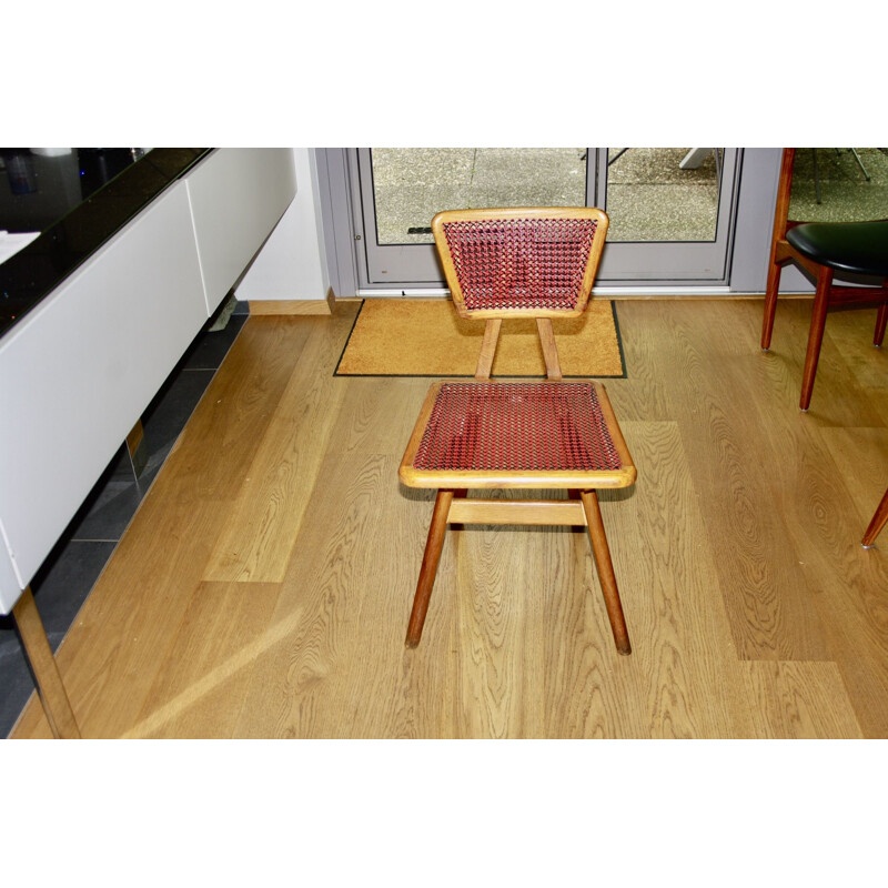 Vintage chair in beech and red and black cane by Pierre Cruège for Roset, 1950