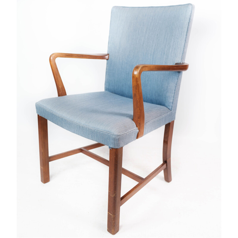 Vintage armchair in mahogany and upholstered with light blue fabric by Fritz Hansen