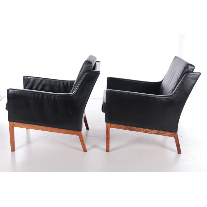 Pair of vintage leather and rosewood armchairs by Kai Lyngfeldt Larsen for Soren Willadsen, Denmark 1960