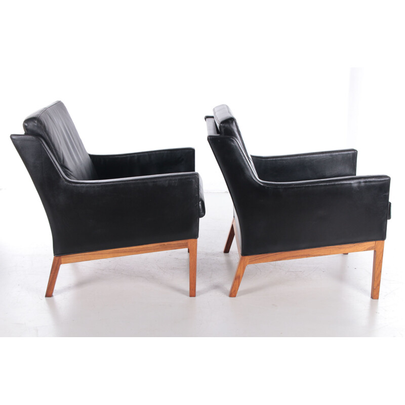 Pair of vintage leather and rosewood armchairs by Kai Lyngfeldt Larsen for Soren Willadsen, Denmark 1960