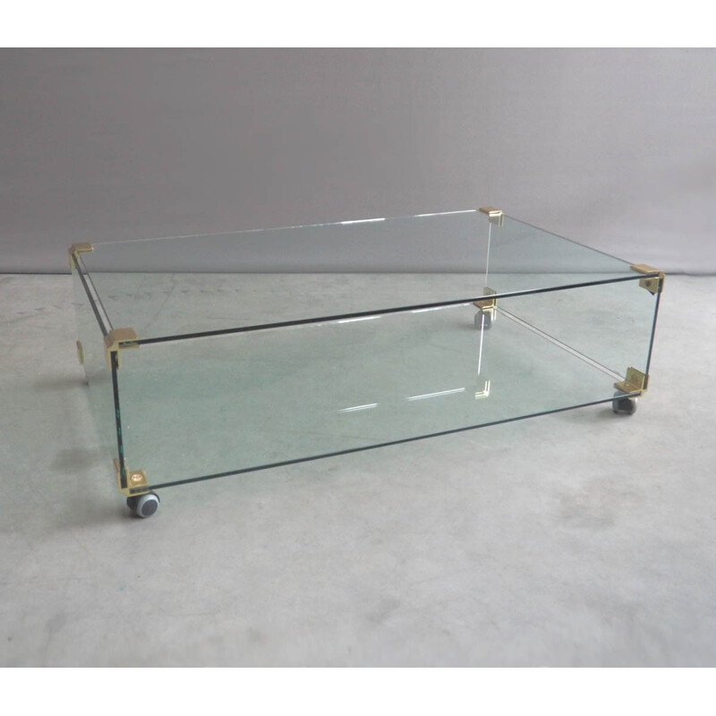 Large glass and brass coffee table on wheels - 1970s