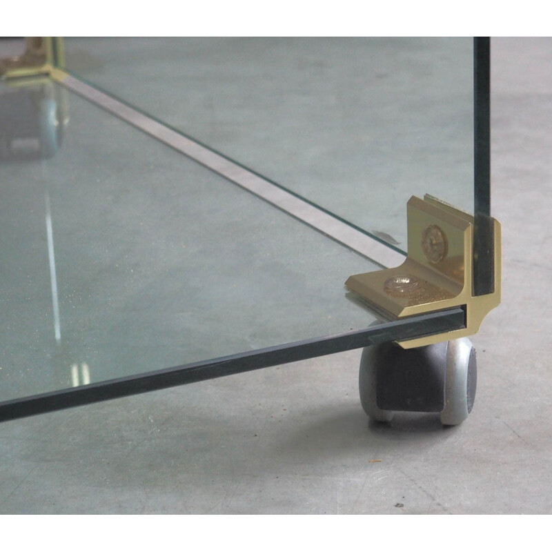 Large glass and brass coffee table on wheels - 1970s