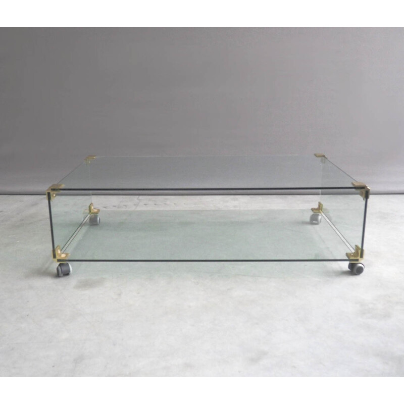 Large glass and brass coffee table on wheels - 1970s