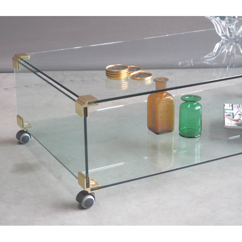 Large glass and brass coffee table on wheels - 1970s