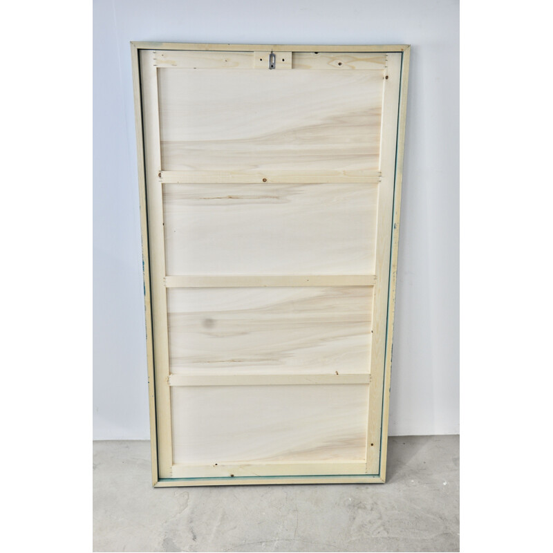Vintage wooden frame containing a fabric