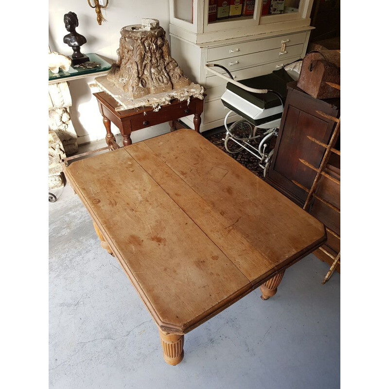 Pine vintage dining table on iron wheels, 1970s