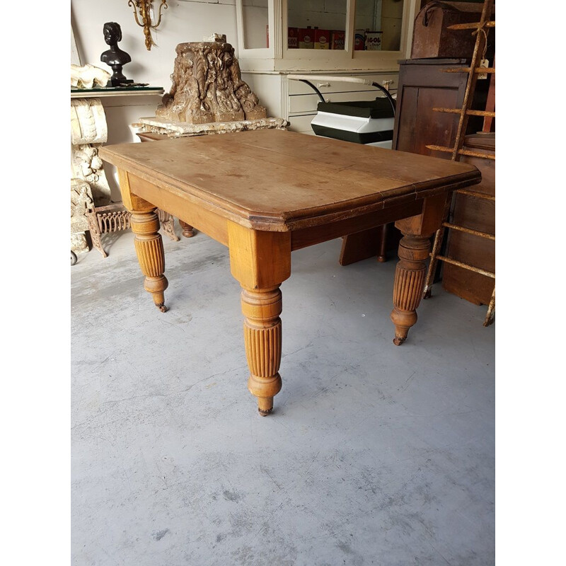 Pine vintage dining table on iron wheels, 1970s