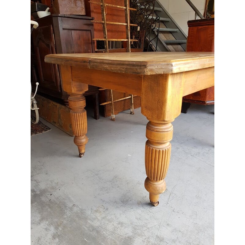 Pine vintage dining table on iron wheels, 1970s