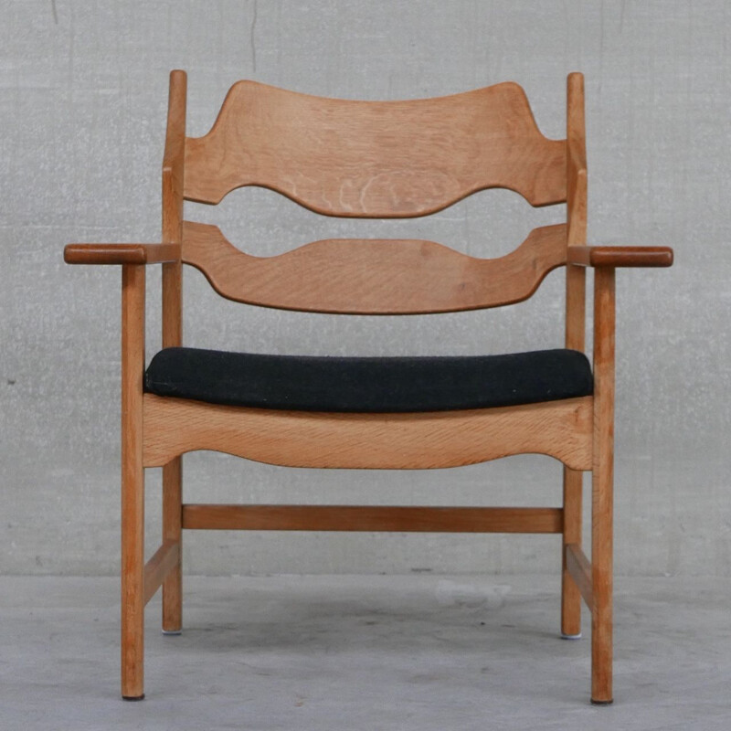 Fauteuil danois vintage en chêne par Henning Kjaernulf, 1960