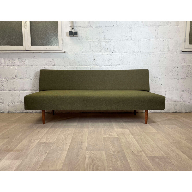 Scandinavian vintage dark green sofa with teak legs, 1960