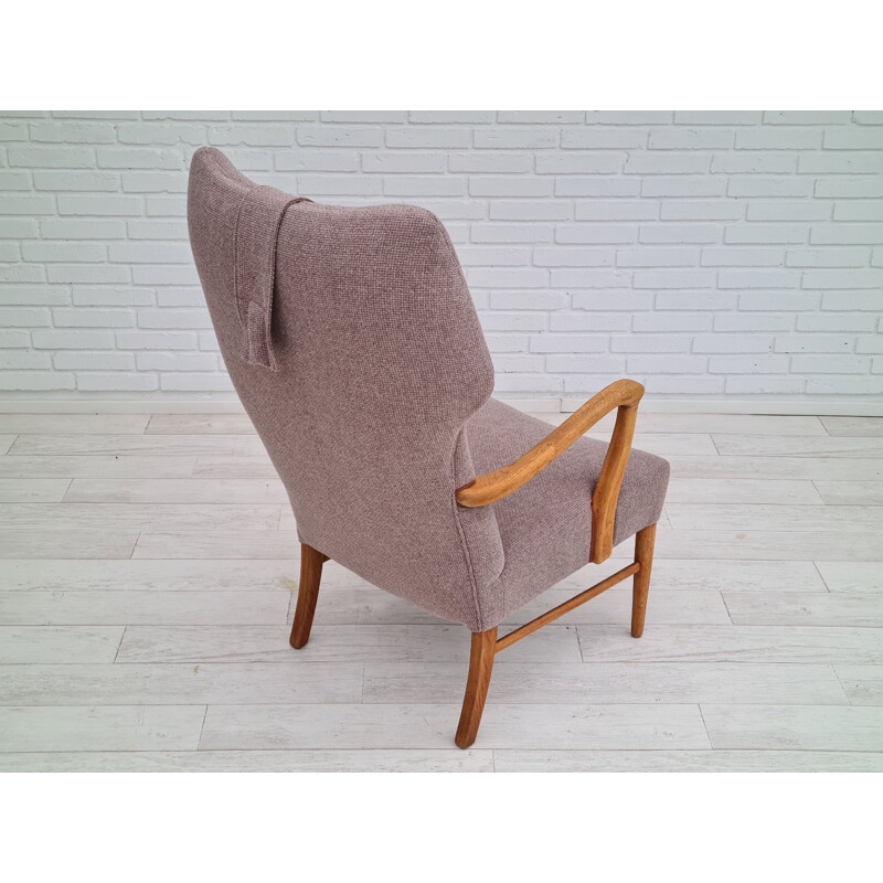 Danish vintage armchair in wool and oakwood, 1960s