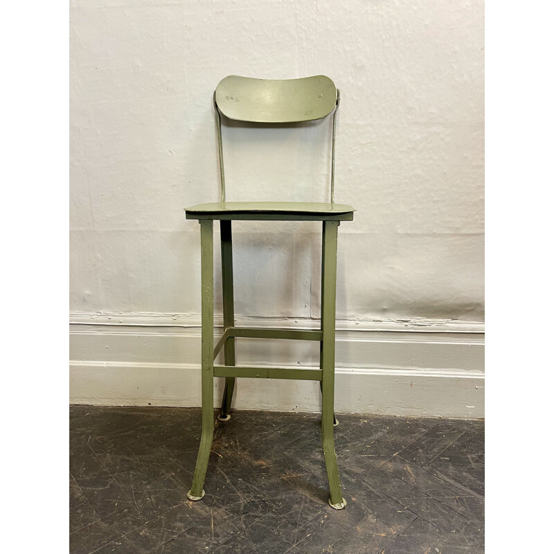 Vintage metal stool with tilting backrest