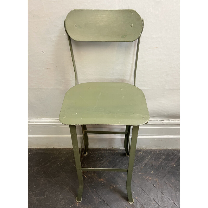 Vintage metal stool with tilting backrest