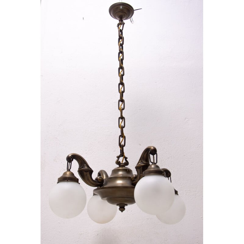 Vintage chandelier with four brass arms