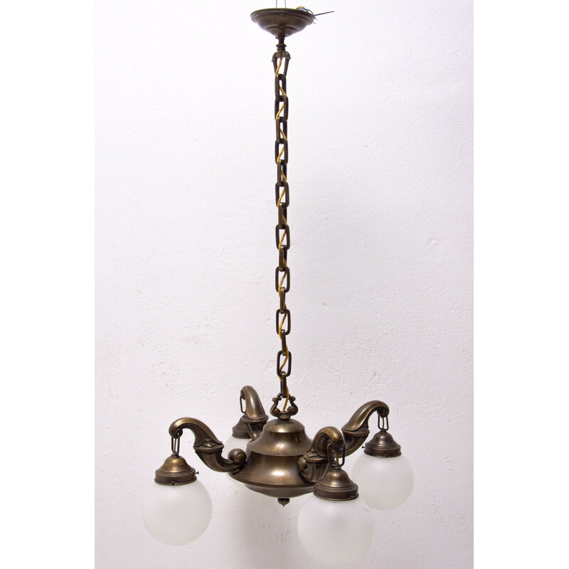 Vintage chandelier with four brass arms