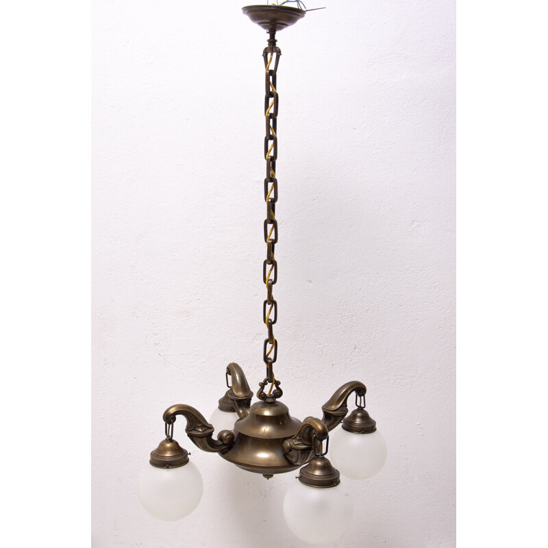 Vintage chandelier with four brass arms