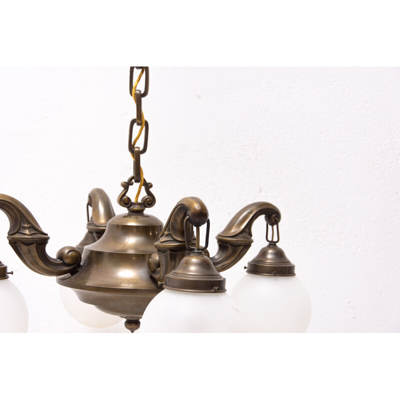 Vintage chandelier with four brass arms