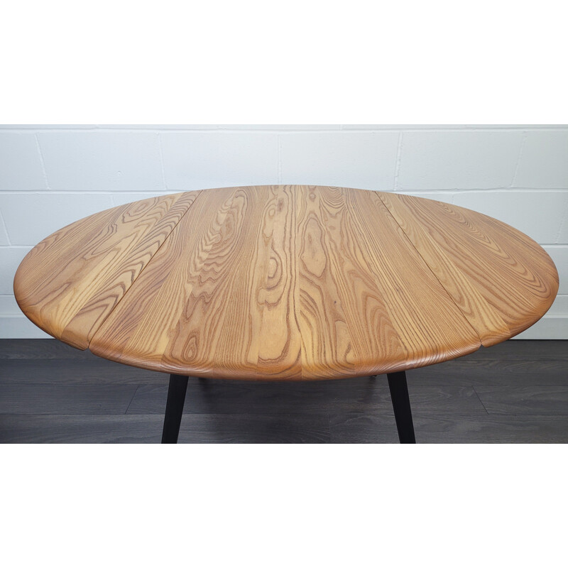 Vintage round drop leaf dining table by Ercol, 1960s