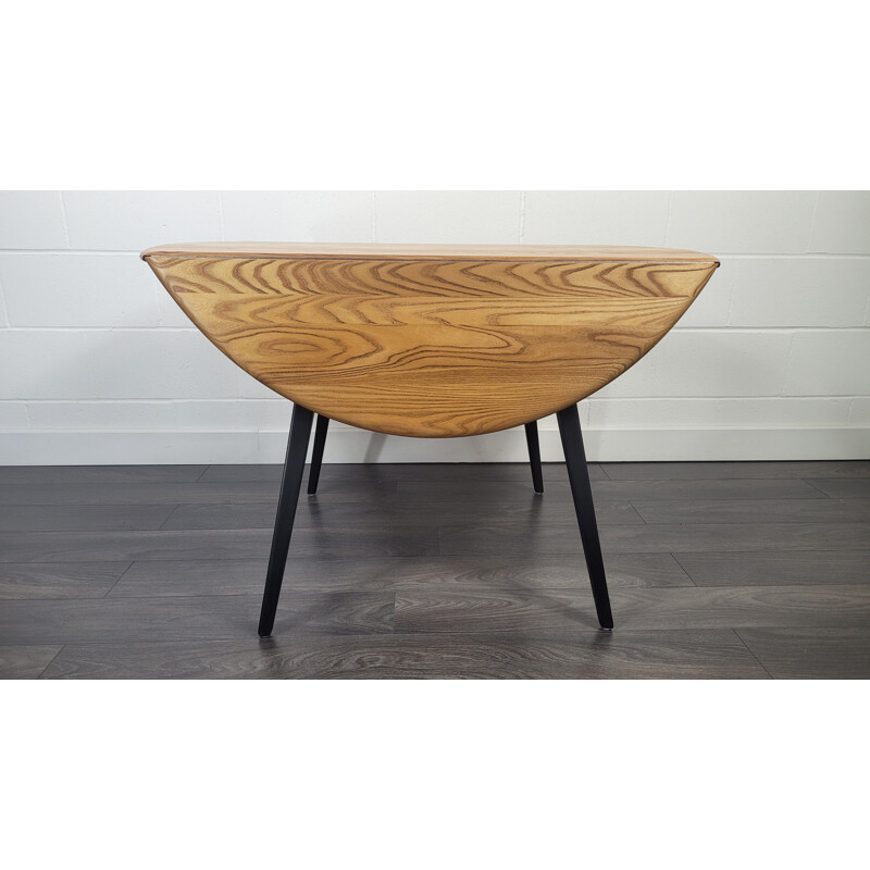 Vintage round drop leaf dining table by Ercol, 1960s