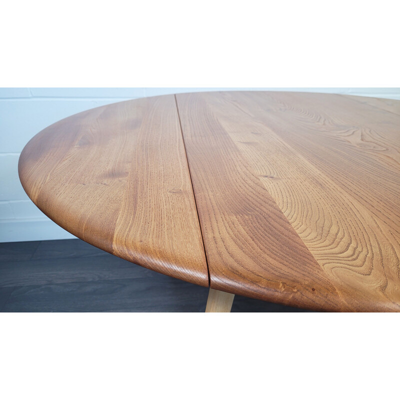 Vintage round drop leaf dining table by Ercol, 1960s