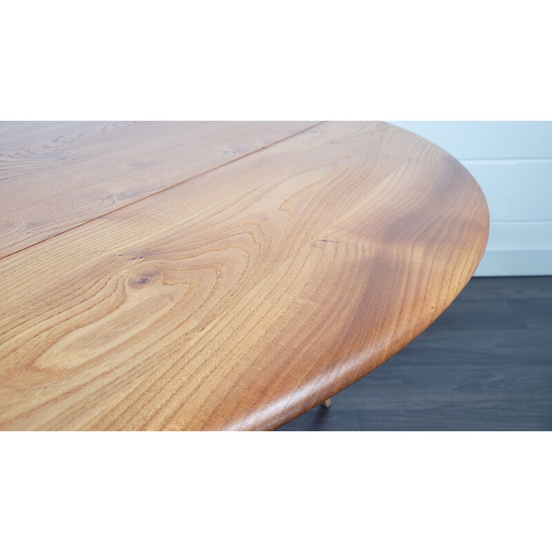 Vintage round drop leaf dining table by Ercol, 1960s