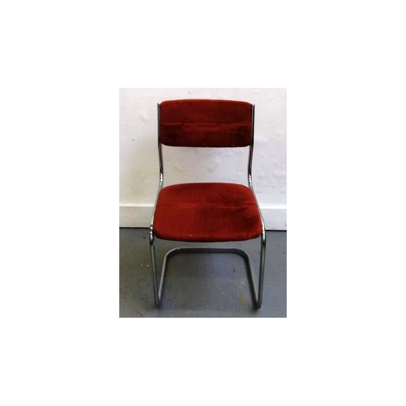 Vintage chair made of burgundy fur and aluminium