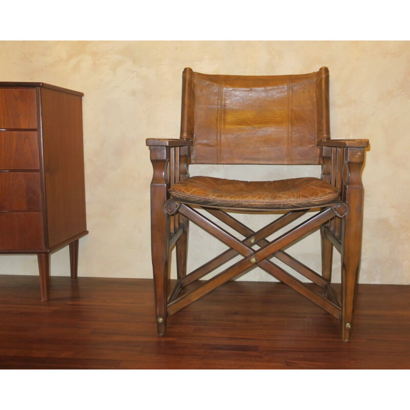 Vintage Safari chair patinated leather and brass details