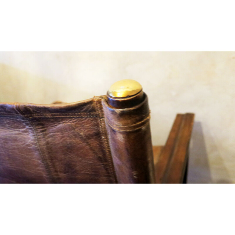 Vintage Safari chair patinated leather and brass details