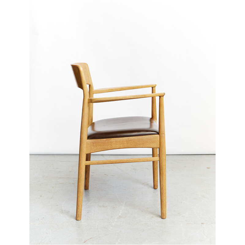 Vintage armchair by Henning Kjærnulf for Korup