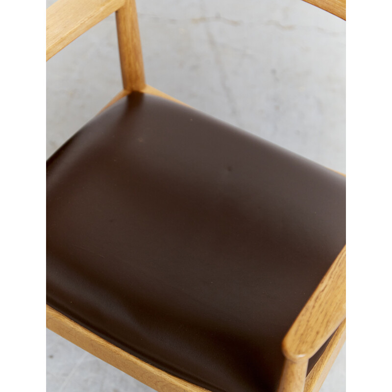 Vintage armchair by Henning Kjærnulf for Korup