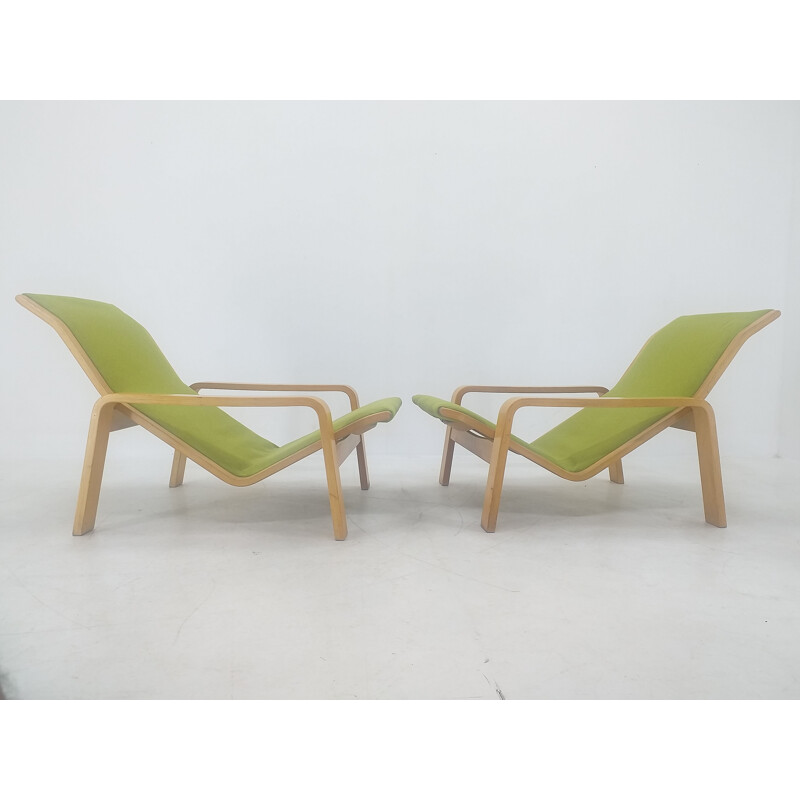 Pair of vintage armchairs and footrests "Pulkka" by Ilmari Lappalainen for Asko, Finland 1970