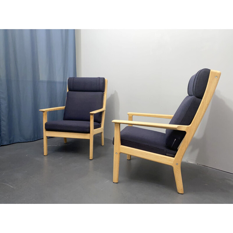 Pair of vintage armchairs in oakwood by Hans J. Wegner for Getama, Denmark 1960s
