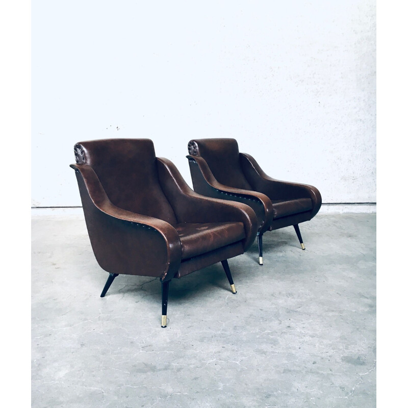 Pair of mid century brown leather armchairs, 1950s