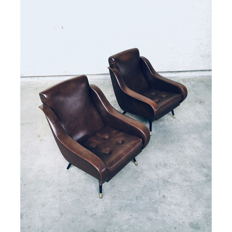 Pair of mid century brown leather armchairs, 1950s