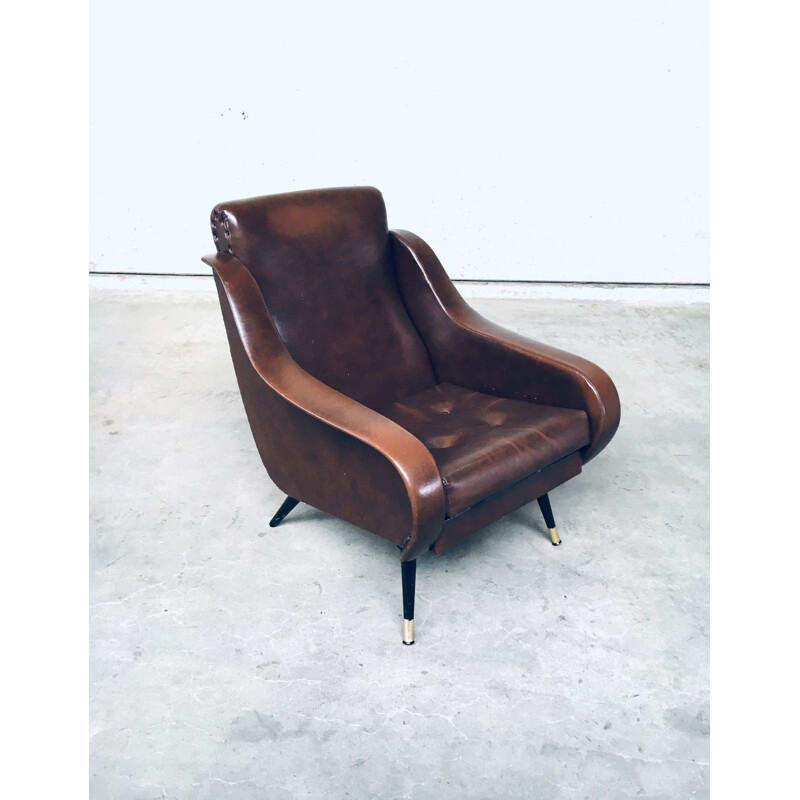 Pair of mid century brown leather armchairs, 1950s